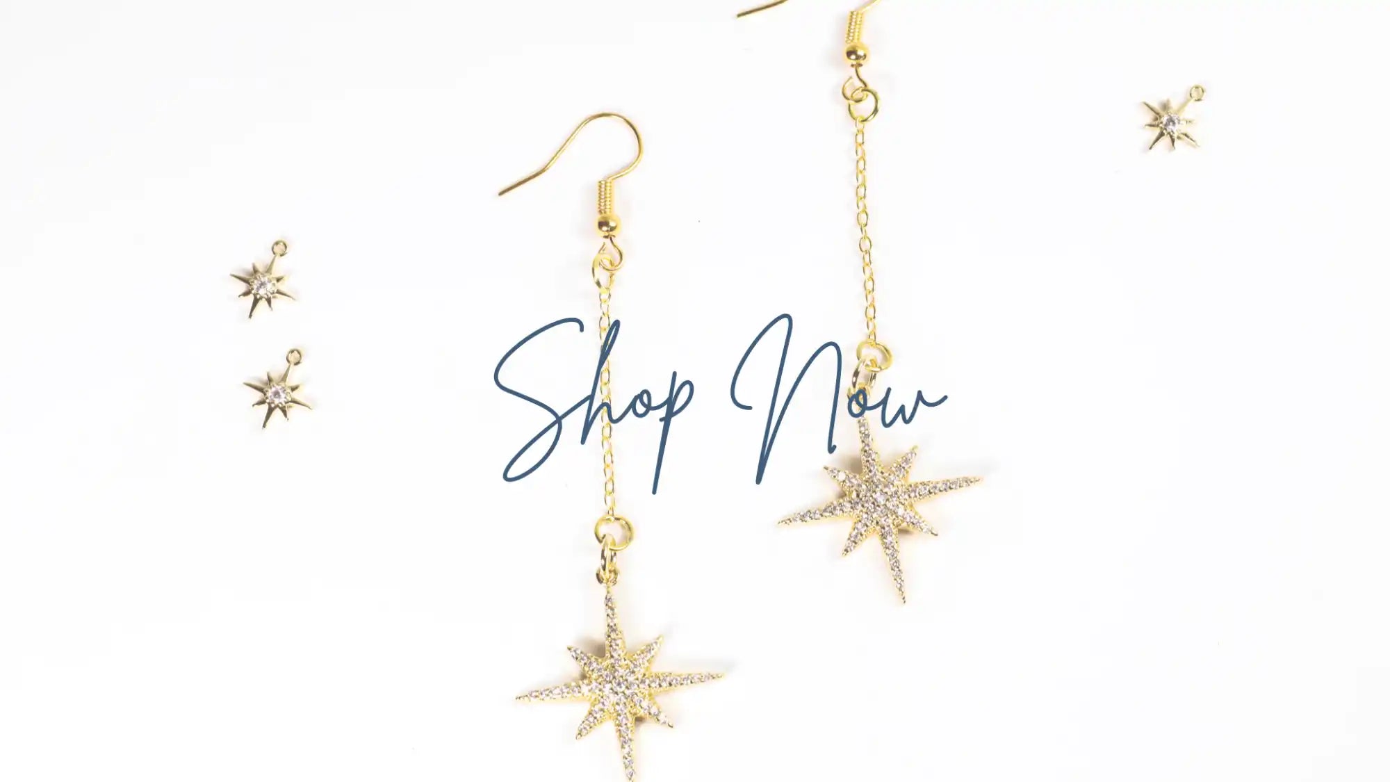 Gold starburst earrings.